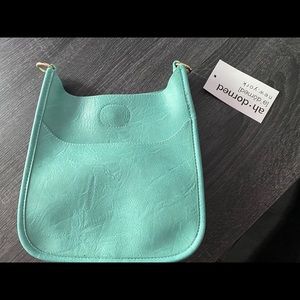 Ah-Dorned small messenger bag.